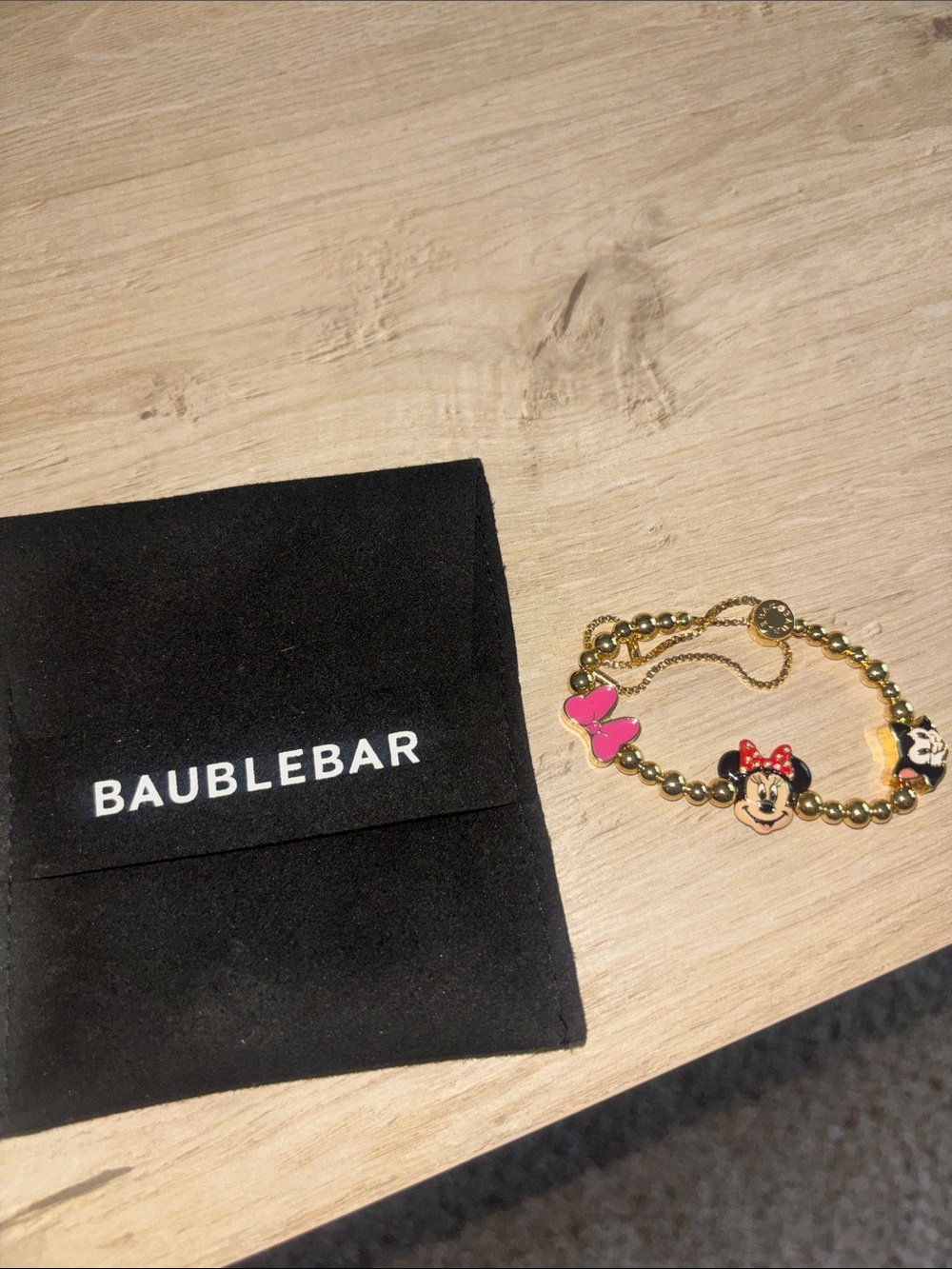 BaubleBar Gold Minnie Mouse Charm Bracelet with Pink and Red Accents
